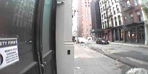 Pedestrians on the sidewalk and cars on the road - live webcam, New York New York