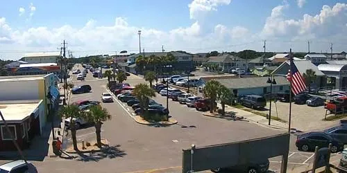 Car parking in front of the beach at Kure Beach webcam