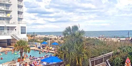 Pool and beach at Sea Watch Resort webcam